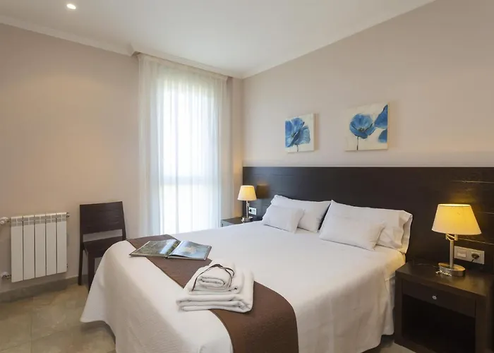 Апартаменты Turisticos Playa De Tapia